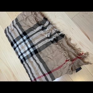 Plaid print scarf.  24” x 78”.